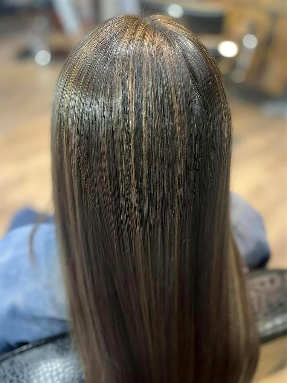 After: glossy dimensional bronde with warm caramel ribbons and a blunt, healthy line.