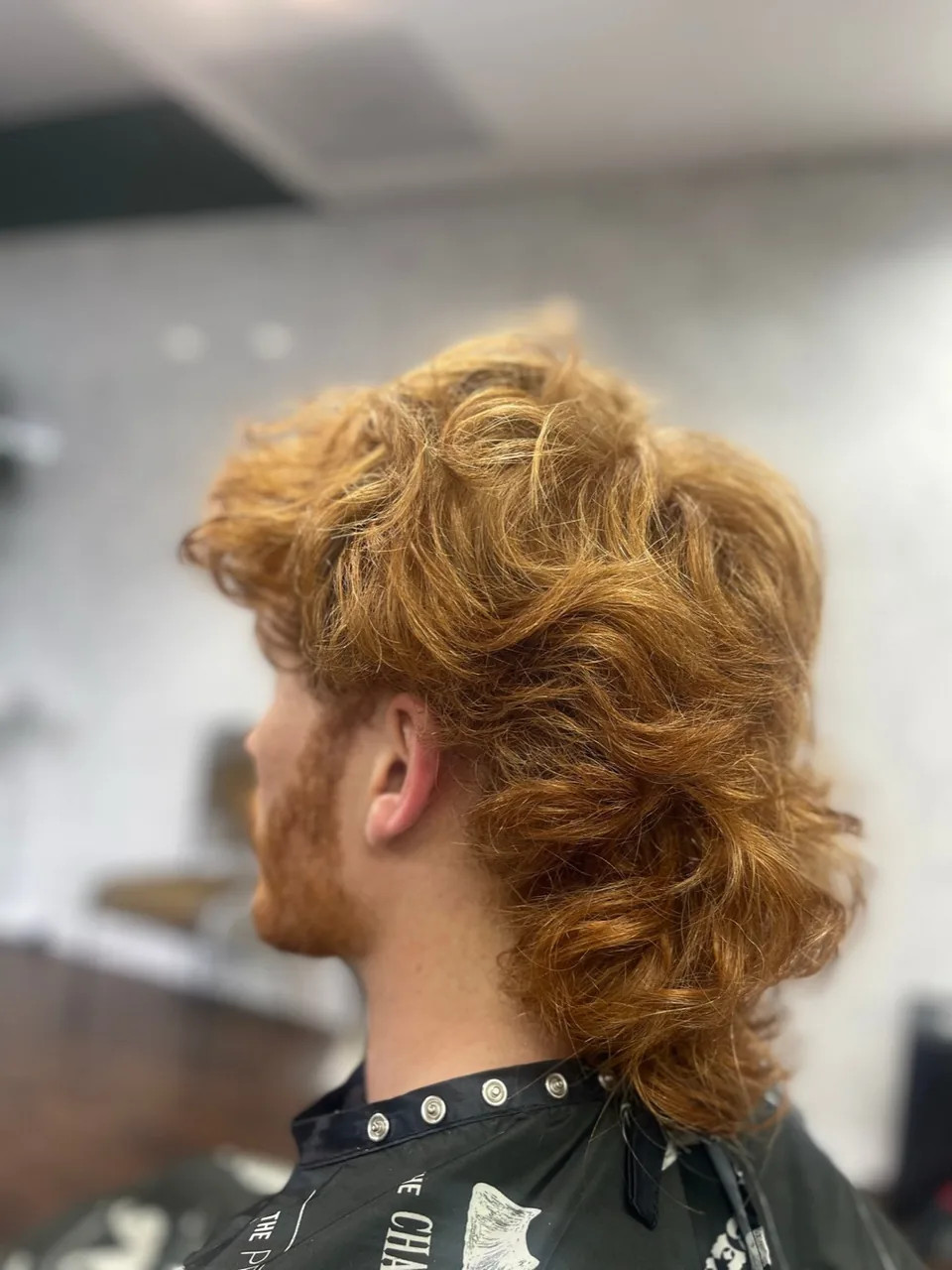 A copper modern mullet with a shaped, layered back.